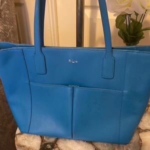 Blue great condition Ralph lauren purse with tons of  space. Outside pockets